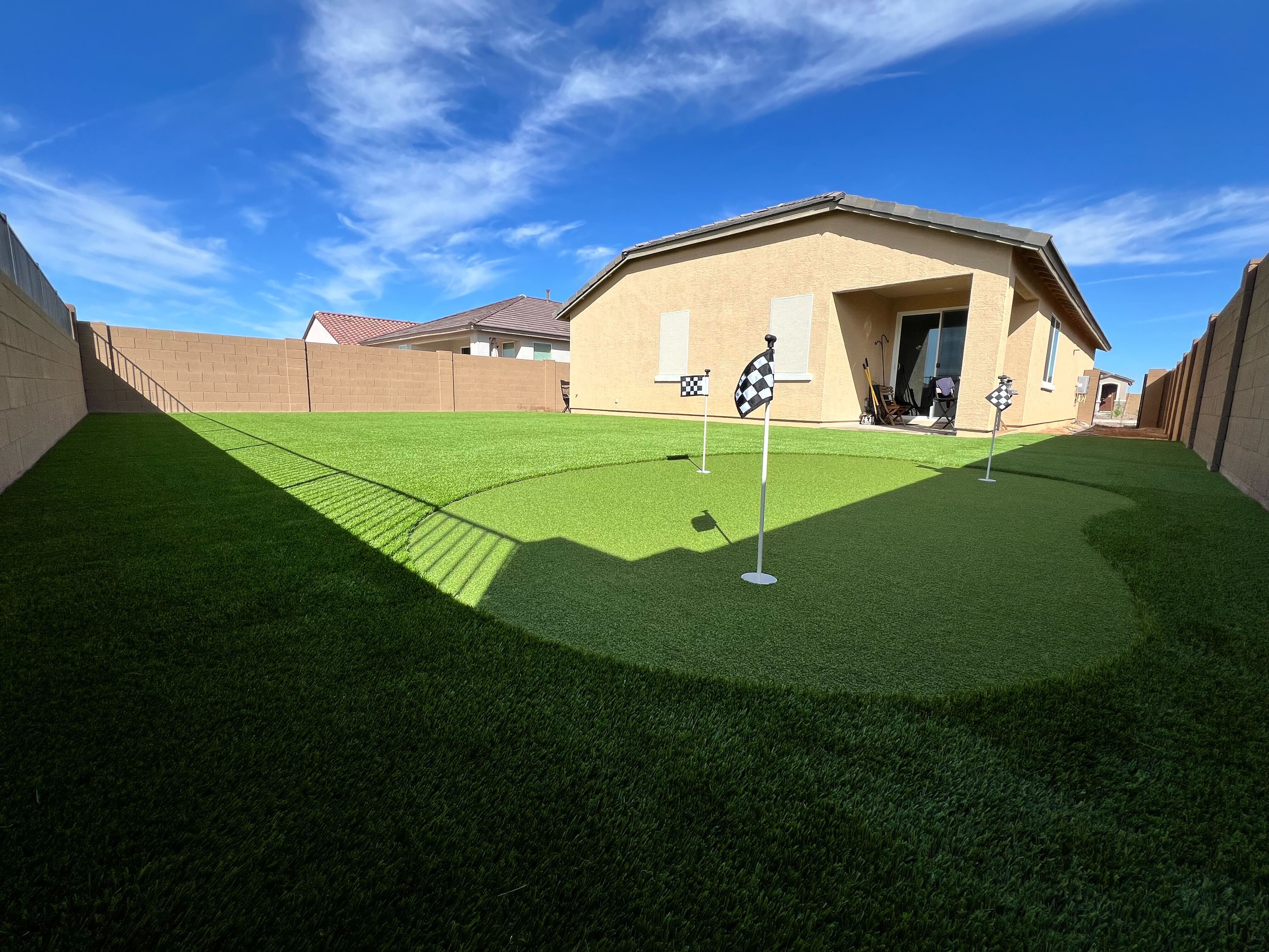 Desert oasis pavers and artificial grass